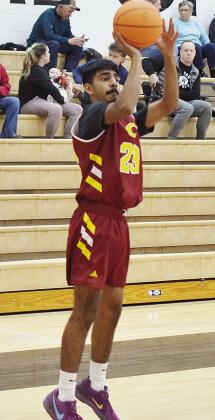 Clinton’s Joseph Nava shoots a three-pointer in the Reds’ JV game against Weatherford. CDN | Sam Goodwyn
