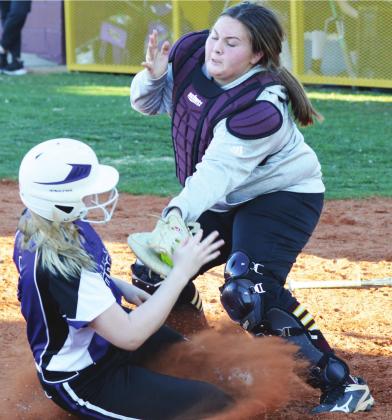 Lady Reds drop slugfest to H-E