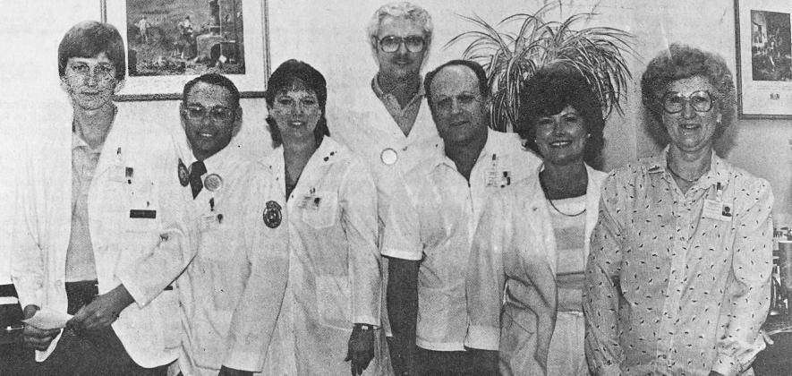 40 YEARS AGO Meeting challenges at Clinton Regional Hospital were laboratory personnel from left, Ernie Robbins, Don Chance, Kathy Nelson, Terry Ratteree, Lab Director Wayland Adams, Carolyn Howell and Oveda Touchstone.