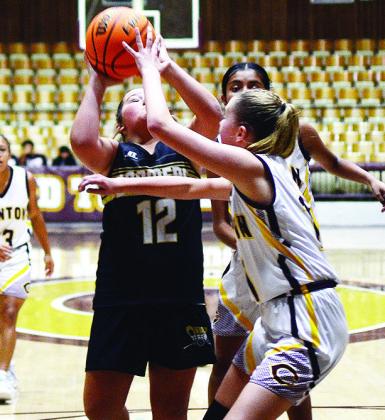 Seventh-grader Quincy Matlock defends against a Lady Boomer during the girls’ home game against Woodward. CDN | Sam Goodwyn