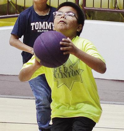 Southwest’s Carlos Roque aims at the basket as he prepares to shoot the ball during warm-ups. CDN | Sam Goodwyn