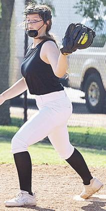 Brinley Taylor keeps her foot on first as she catches the ball in a drill during practice. CDN | Sam Goodwyn