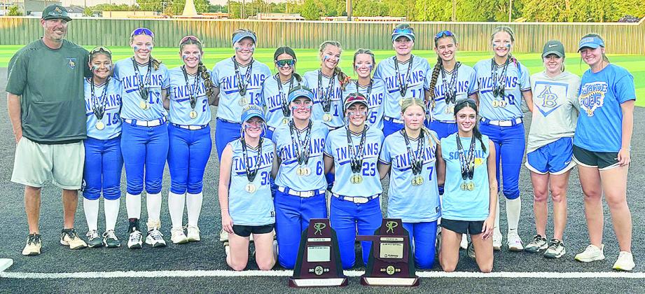 Despite the outcome, the Arapaho-Butler Lady Indians’ softball team are all smiles as they pose with the Class 3A State Runnerup and the Class 3A Academic State Championship trophies after the title game against Caddo Monday at the FireLake Ball Fields 