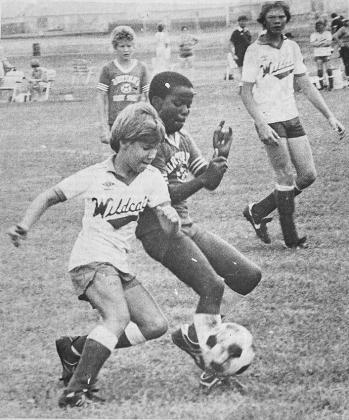 40 YEARS AGO Keeping his eye and his foot on the ball, Orenthieal Hester of the Clinton Red Tornadoes absorbed a shoulder block from an Oklahoma City Wildcat in action at the state soccer tournmant.