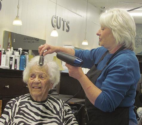 Jennifer Vowell tends to the hair of Wilma McGregor at Scissor Talk hair studio in Clinton. CDN | Christian Jacobsen
