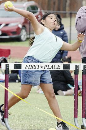Dakota Chavez hurls the softball as hard as she can during Little Olympics at Clinton High School. CDN |Sam Goodwyn