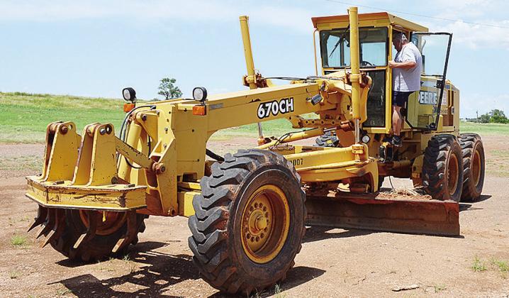 Rod Fauver climbs into the Road Grader Tuesday at the Clinton Speedbowl as he works to get the raceway open for business. CDN | Sam Goodwyn
