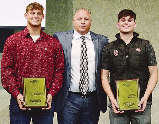 To end the annual football banquet, awards are handed out to deserving players. Pictured, from left, are Clinton’s Wyatt Willoughby, Coach John Higbee and Joel Badillo. Willoughby and Badillo were awarded the Fred Friedrich Award for this season. CDN | 