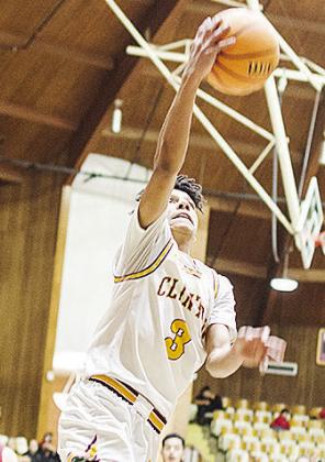 Clinton’s Titan Malone goes up for the layup during the Reds’ home game against Elgin this year. CDN | Sam Goodwyn