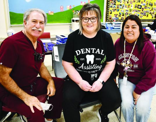 Brenda Martinez, a WTC dental assisting graduate (2007) and now second-grade teacher at Southwest Elementary School, at right, met up with her former instructor, Kelly Pease, middle, and the dentist she worked with for 15 years, Dr. Floyd Simon Jr., durin