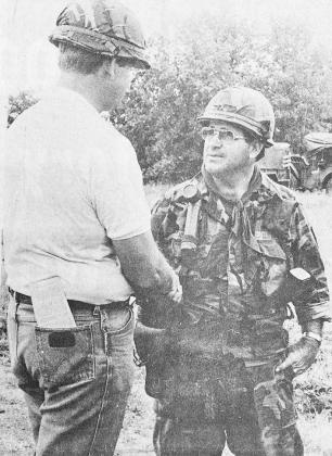 40 YEARS AGO Sgt. Ken Nunemaker, right, of the Clinton Guard Armory spoke with Jim Minnix, Clinton Middle School principal, at Fort Sill.