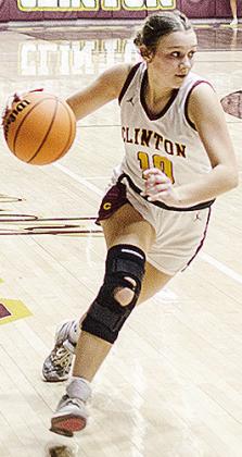 Clinton’s Hadley Meget drives the ball into the lane during the Lady Reds’ home game Saturday against Elk City. CDN | Sam Goodwyn
