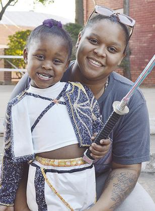 Anya Brooks, daughter of Keniece and Johnny Brooks, won second place in the 3-year-old category as Rumi from K-Pop Demon Hunters.