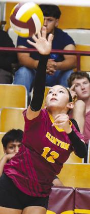 Clinton’s Jocelyn Lagunas focuses as she serves the ball during the Lady Reds’ home win Thursday against Blair. CDN | Sam Goodwyn