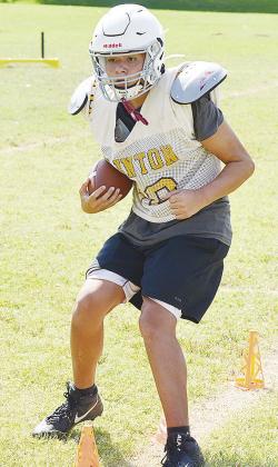 Cam’Ron Lime carries the ball in a ball-handling drill during practice at the practice fields. CDN |Sam Goodwyn