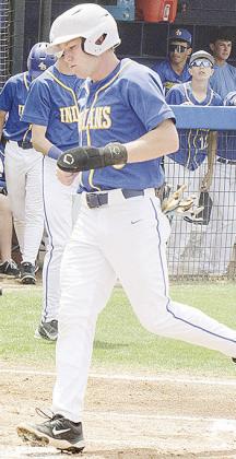 Jiles Southall steps on home plate and scores a run during A-B’s home win over Empire Friday to win the regional championship. CDN | Sam Goodwyn