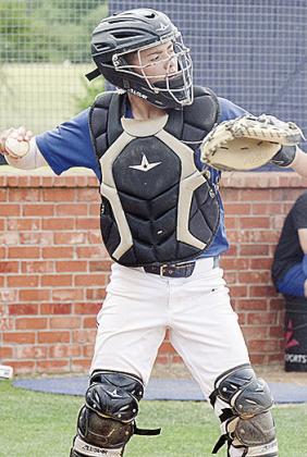 A-B catcher Jack Goldsberry throws the ball back to the pitcher after an at bat during the Indians’ win Friday at home over Empire for the regional title. CDN | Sam Goodwyn