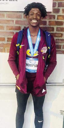 Thompson sets school record in long jump