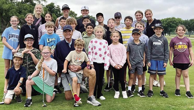 Everyone is all smiles after a day of golfing in a kids’ golf clinic at Riverside Golf Course Friday. Pictured in front, from left, are Gentri Jones, Aaron Pool, Joslyn Roll, Perry Adams, Ridge Booze, Willow Mayfield, Hazel Mayfield, Nash Cornell, Hudso
