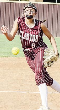 Clinton’s Hadley Meget pitches during the Lady Reds’ home game Monday against Bishop McGuinness. CDN | Sam Goodwyn