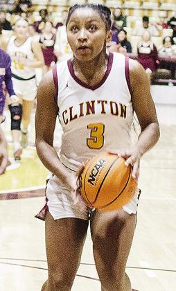 Clinton’s Arlena Kirkendoll focuses on the basket as she drives toward it during the Lady Reds’ game against Anadarko. CDN | Sam Goodwyn