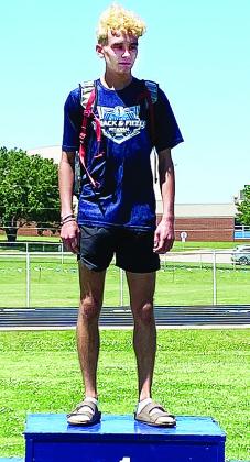 Clinton’s Xadrian Hernandez stands at the top of the standings for the 3,200-meter race Tuesday in the Meet of Champions in Stroud. CDN | Courtesy Photo