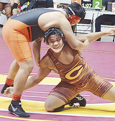 Lorne qualifies for two national wrestling tourneys