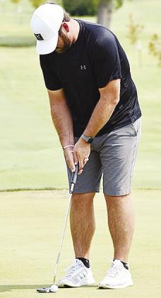 Keegan Hall of Elk City focuses on the ball as he prepares to putt it during the 69th annual Labor Day Golf Tournament at Riverside Golf Course. CDN | Courtesy Photo