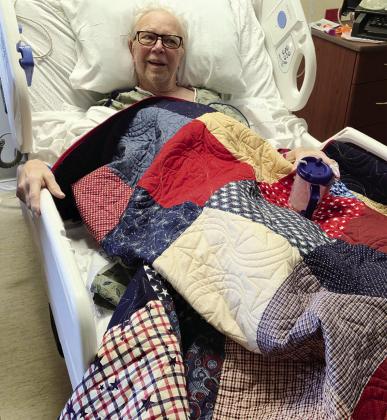 Fred Stehr was scheduled to be presented a Quilt of Valor earlier but was unable to attend the ceremony due to illness. He was presented the quilt recently at the hospital and is seen here beaming with pride. Stehr served in the U.S. Army. The quilt was pieced by Monica Kirby and was quilted by Catherine Hladik. CDN | Courtesy photo