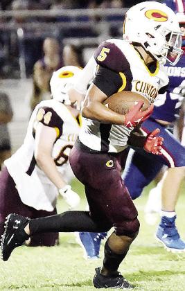 Clinton’s Jesus Gutierrez carries the ball late in the game Friday against Chandler. CDN | John Kinsey