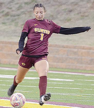Clinton’s Alyvia Williams kicks the ball downfield in the Lady Reds’ season-opening win Tuesday against Southeast in the Tornado Bowl. CDN | Sam Goodwyn