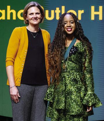Christy Edelen, left, stands with honoree Ehimen Umobuarie during the 40th Academic All-State Awards Celebration. CDN | Courtesy photo