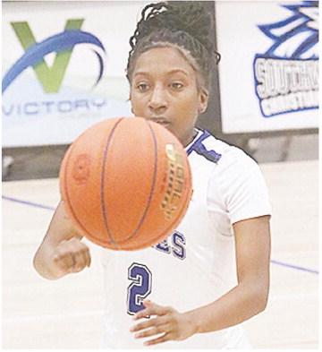 Former Clinton Lady Red Carmella Jefferson passes the ball during a game for Southwestern Christian University this season. CDN | Courtesy photo