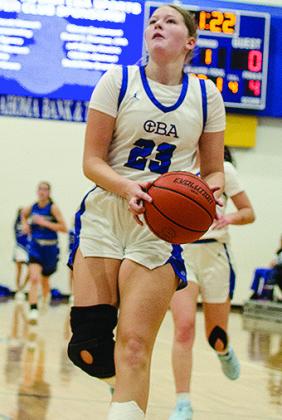 No. 23 Audrey Stewart drives to the basket as she goes up for the layup in CBA’s win over the Lady Diamondbacks. CDN | Sam Goodwyn