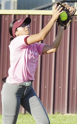 Clinton’s Audrina Trout reaches out to make the catch for the out during the Lady Reds’ game Thursday at home against Bethany. CDN | Sam Goodwyn