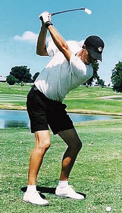 Heston Brown of Cordell gets into his back swing as he prepares to hit the golf ball during the Labor Day Tournament at Riverside Golf Course over the weekend. CDN | Courtesy Photo