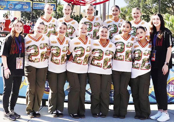 The Clinton High School dance team poses for a team photo while down in Orlando, Fla., competing at the National High School Dance Competition last weekend. Pictured, from left, in front are Coach Payten Childers, Lyssa Day, Tatum Shackelford, Stella Meac