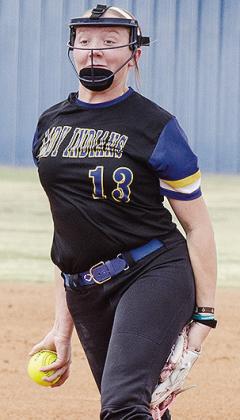 No. 13 Lauryn McHenry goes into her pitch during A-B’s win Friday over Ninnekah in the district tournament. CDN | Sam Goodwyn