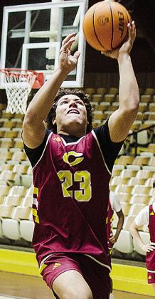 Clinton’s Easten Powell goes up for the layup during a basketball practice at the Tornado Dome. CDN | Sam Goodwyn