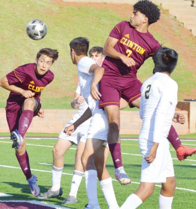 Clinton secures semifinal spots