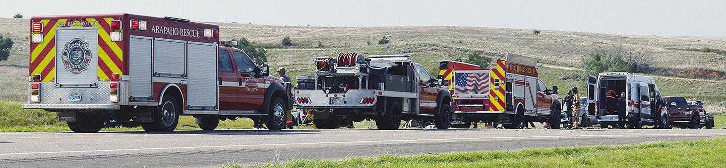 Emergency responder vehicles line up early Thursday evening along U.S. Highway 183 in an effort to administer aid to the victims of an alleged head-on collision. CDN | Christian Jacobsen
