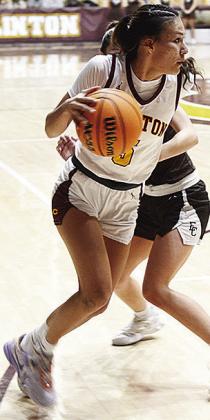 Lillian Lime fights through a defender during the Clinton girls’ recent home game against Elk City. CDN | Sam Goodwyn