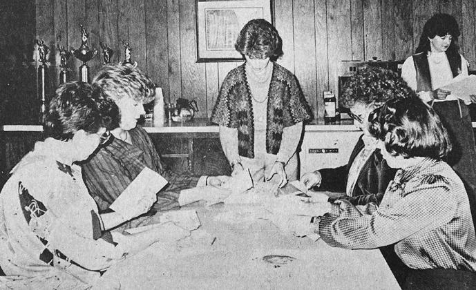 40 YEARS AGO Preparing packets was one of the things a marcher must do before embarking on her trek from door to door. Shown here getting ready from left were, Kathy Edwards, Carliss Lodge, Katherine Heerwald, Katrena Rightnowar and Bonnie Trissell. Kelle