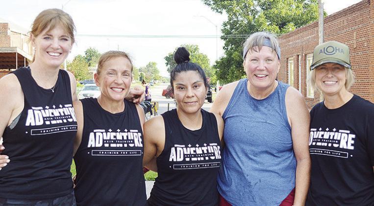 From left, Mary Eagan, Tamara Thomas, Rosa Morales, Michelle Ventris, and Traci Heerwald smile after completing the Red Dirt Fit Games at the Clinton Route 66 Festival and Car Show. CDN | Micah Ashcraft