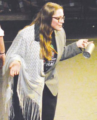 Amy Baker pulls double duty while playing both Mr. and Mrs. Cratchit during the Southwest Playhouse’s production of “A Christmas Chaos.” CDN | Micah Ashcraft