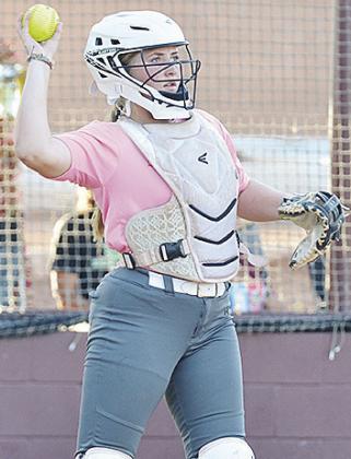 Rhylee Rodebush throws the ball back to the pitcher during Clinton’s home game Thursday. CDN | Sam Goodwyn