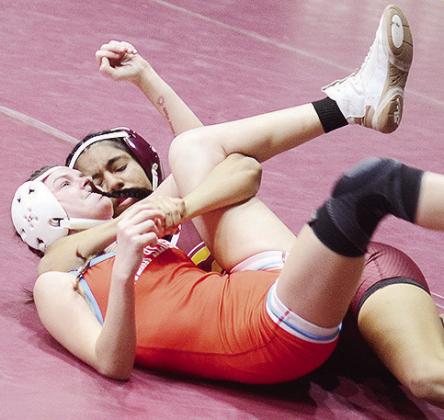 Clinton’s Aaliyah Arredondo manages to pin her Western Heights opponent during the Hub City Wrestling Tournament Friday at the Tornado Dome. CDN | Sam Goodwyn