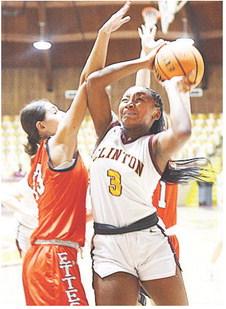 Clinton’s Arlena Kirkendoll fights through a Lindsay defender during the Lady Reds’ game against the Leopardettes at the Tornado Dome. CDN |Sam Goodwyn