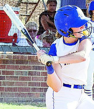 Kelsey Garibay stiffens as she prepares to swing during A-B’s walk-off win over L-S at home Tuesday. CDN | Sam Goodwyn
