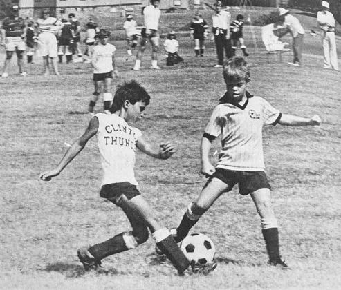 40 YEARS AGO Clinton Thunder soccer team member Ryan Fuentez put in some fancy footwork against a member of the Oklahoma City Pac in under-8 play at the state soccer tournament held in Tulsa.